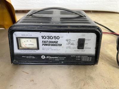 AUTO RAMPS AND A SCHUMACHER BATTERY CHARGER