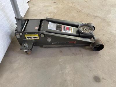 3 TON FLOOR JACK AND A 4 WAY LUG WRENCH