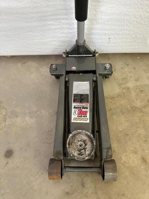 3 TON FLOOR JACK AND A 4 WAY LUG WRENCH