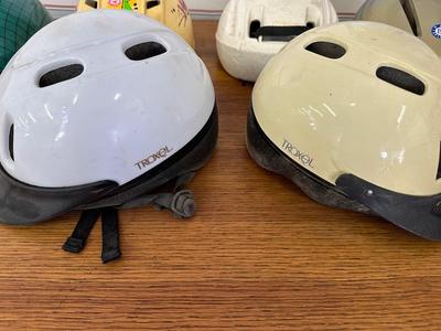 SNOW SLEDS AND HELMETS
