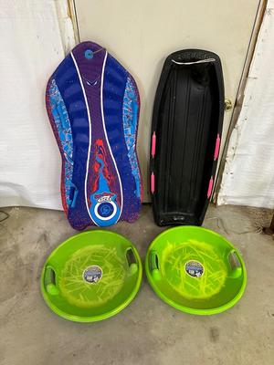 SNOW SLEDS AND HELMETS