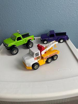 NYLINT TOW TRUCK AND 2 TOOTSIETOY FORD PICK-UPS