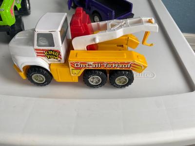 NYLINT TOW TRUCK AND 2 TOOTSIETOY FORD PICK-UPS