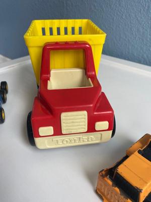 TONKA TRUCKS AND A BUDDY L DOZER