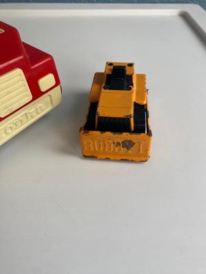 TONKA TRUCKS AND A BUDDY L DOZER