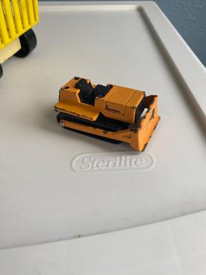 TONKA TRUCKS AND A BUDDY L DOZER