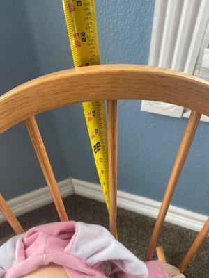 CHILD SIZE ROCKING CHAIR AND TOTE FULL OF DOLL CLOTHES