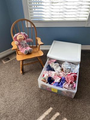 CHILD SIZE ROCKING CHAIR AND TOTE FULL OF DOLL CLOTHES