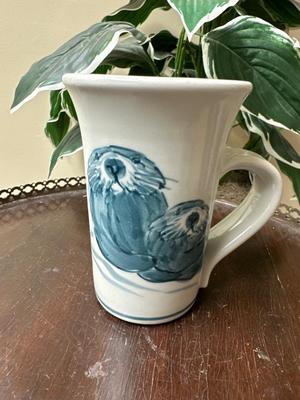 Hand crafted otter mug pottery