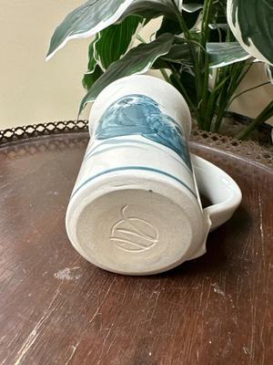 Hand crafted otter mug pottery