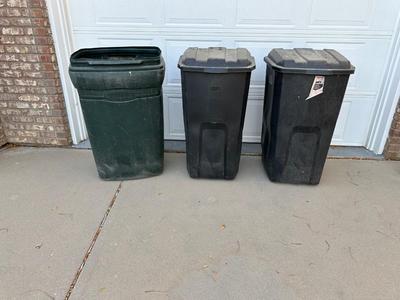 THREE 45 GALLON TRASH CANS ON WHEELS