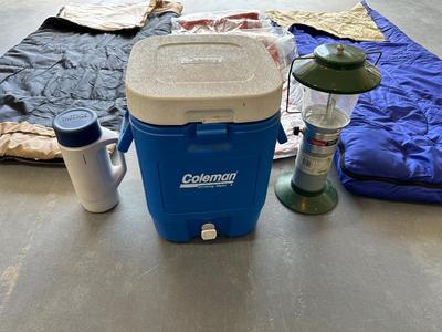 2 SLEEPING BAGS, TWIN INFLATABLE MATTRESS, COLEMAN LANTERN AND COOLER