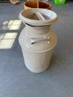 OLD MILK CAN AND A BARREL MAGAZINE STAND