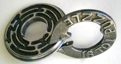 Vintage Cast Iron 16 to 1 PUZZLE