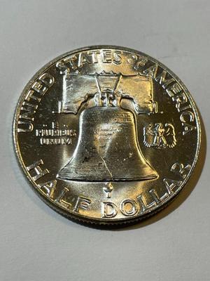 1955 BU CONDITION FRANKLIN SILVER HALF DOLLAR AS PICTURED.