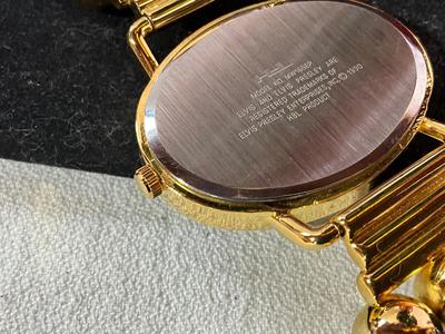 Elvis Watch, Cribbage board, flowers