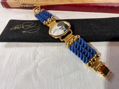 Elvis Watch, Cribbage board, flowers