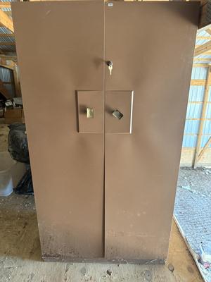 Metal cabinet w/locking door