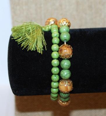 2 Piece Green Expandable Bracelet Set with "Crown" Beads & Tassel 3" Diameter