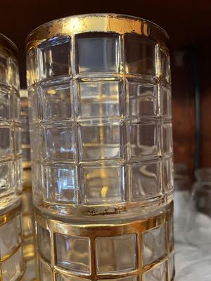 FOUR SMALL JUICE GLASSES, GOLD TONED GLASSES