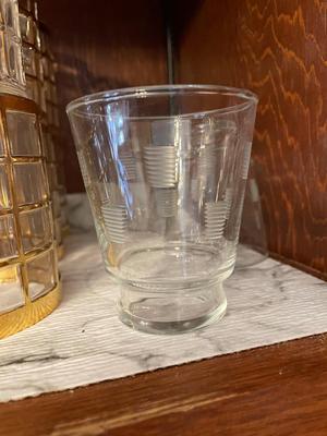 FOUR SMALL JUICE GLASSES, GOLD TONED GLASSES
