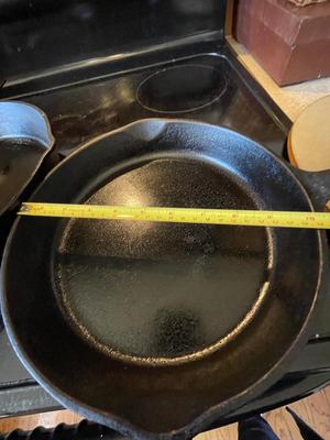 HUEY CHANG PIZZA STONE. TWO CAST IRON SKILLETS