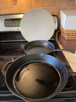 HUEY CHANG PIZZA STONE. TWO CAST IRON SKILLETS