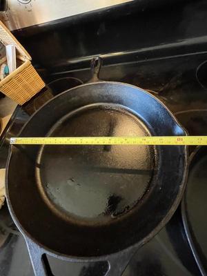 HUEY CHANG PIZZA STONE. TWO CAST IRON SKILLETS