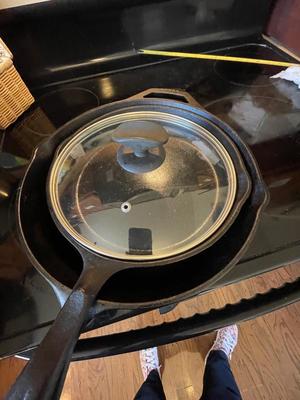 HUEY CHANG PIZZA STONE. TWO CAST IRON SKILLETS
