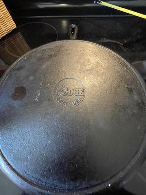 HUEY CHANG PIZZA STONE. TWO CAST IRON SKILLETS
