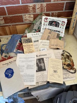 2 vintage Christmas aprons and old papers