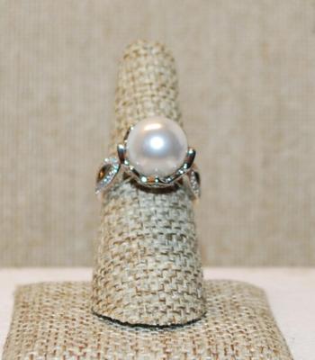 Size 7½ Faux White Pearl Set in a "Crown Cradle" with Side Accents on a Silver Tone Band (5.2g)