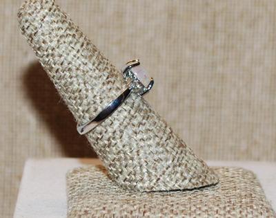 Size 7 Oval Iridescent Opal-Style Stone Ring with 3 Clear Side Stone Accents on a Silver Tone Band (2.4g)