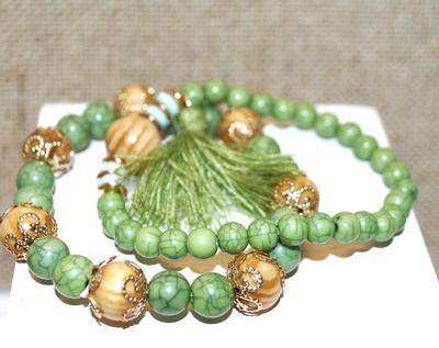 2 Piece Green Expandable Bracelet Set with "Crown" Beads & Tassel 3" Diameter