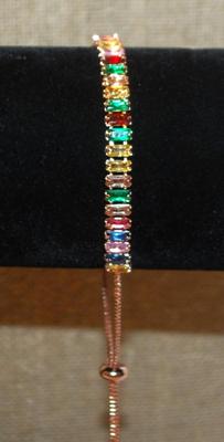 Very Colorful Line of Stones Bracelet (9") on a Rose Gold Setting & Bolo Clasp