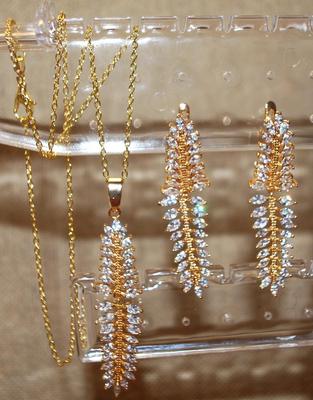 JEWELRY SET Includes Caterpillar Earrings (2" x ½") with English Lock Clasp & PENDANT (2" x ½") on a Gold Tone...