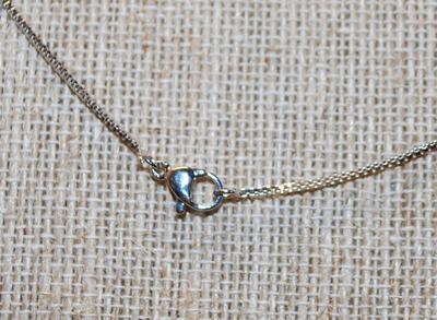 Oval Cut Sea Blue Stone with a Clear Stone on Top PENDANT (½" x ¼") and Double Hooks on a Silver Tone Necklace Chain 17" L