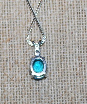 Oval Cut Sea Blue Stone with a Clear Stone on Top PENDANT (½" x ¼") and Double Hooks on a Silver Tone Necklace Chain 17" L
