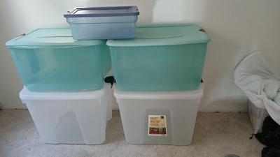 Five totes 4 large sized and one smaller tote with lids