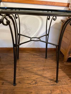 BEVELED GLASS TABLE WITH FOUR IRON CHAIRS