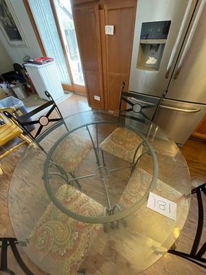 BEVELED GLASS TABLE WITH FOUR IRON CHAIRS