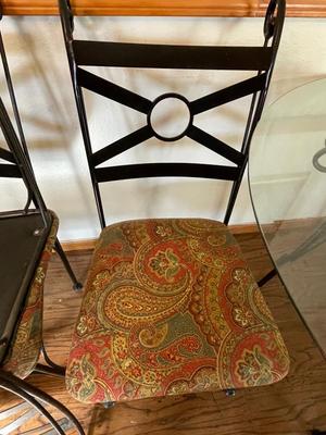 BEVELED GLASS TABLE WITH FOUR IRON CHAIRS