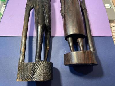 2 Vintage Ebony Hand Carved African Wood Statue Figurines w/Spears 12" & 15" in Good Preowned Condition as Pictured.