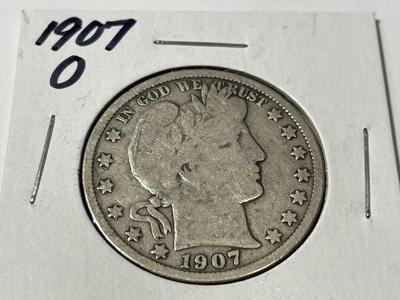 1907-O CIRCULATED CONDITION BARBER SILVER HALF DOLLAR AS PICTURED.