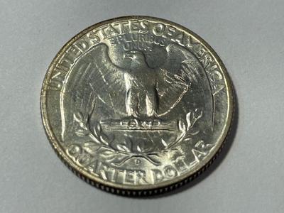 1947-D UNCIRCULATED CONDITION WASHINGTON SILVER QUARTER AS PICTURED.