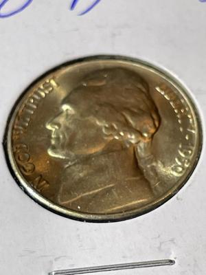 1950-D CHOICE UNCIRCULATED CONDITION LIGHTLY TONED JEFFERSON NICKEL AS PICTURED.