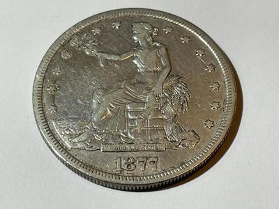 1877-S VERY FINE CONDITION (UNCERTIFIED) TRADE SILVER DOLLAR TYPE COIN AS PICTURED.