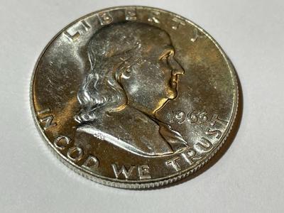 1963-D UNCIRCULATED CONDITION FRANKLIN SILVER HALF DOLLAR AS PICTURED.