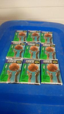 LOT 19 NINE UNOPENED PACK OF VINTAGE BASKETBALL CARDS