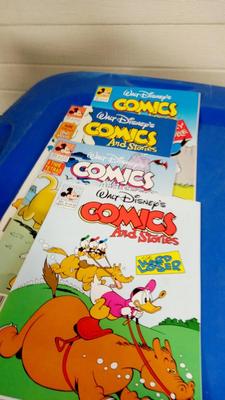 LOT 29 LOT OF FOUR VINTAGE WALT DISNEY COMICS